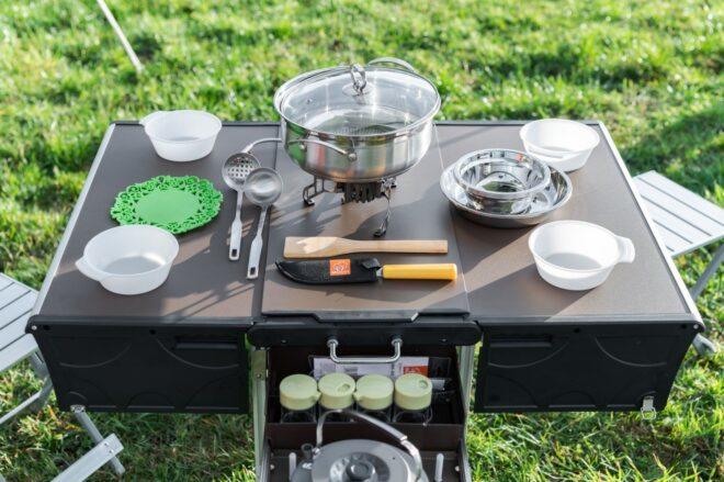 camping table with burner on top