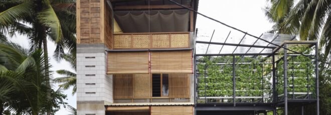 closeup of a building with blinds that are in various stages of being rolled up