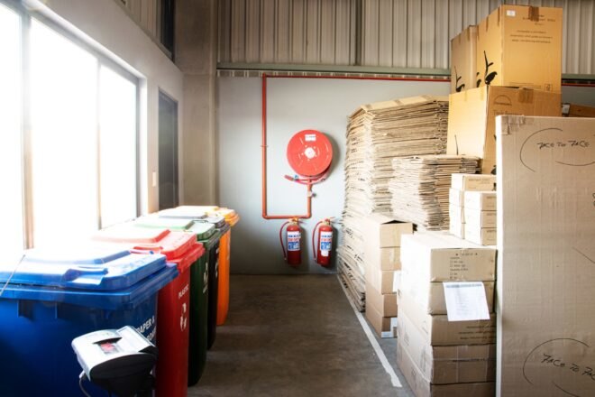 interior room with trash cans and storage