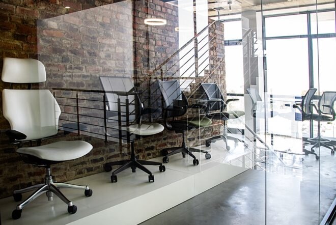 interior office space with brick walls and glass