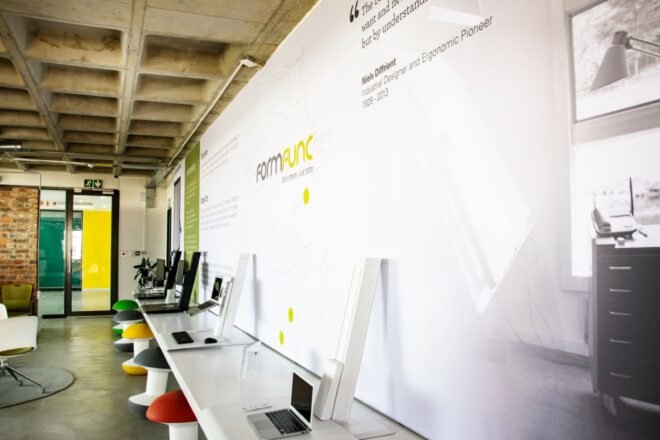 interior office space with white walls and computers