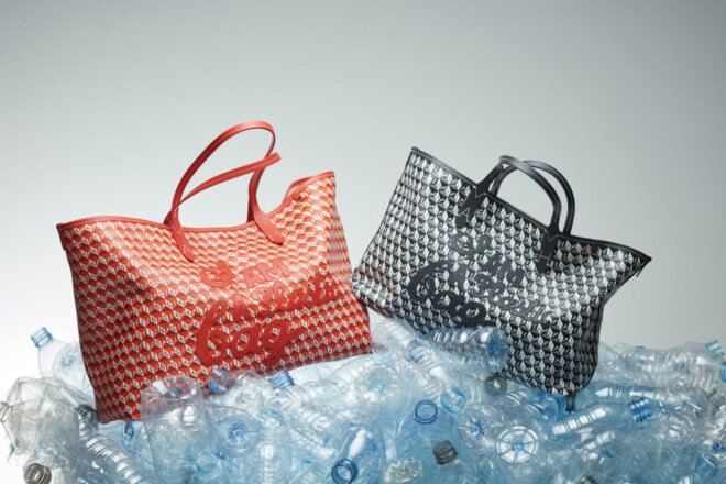 red tote bag and black tote bag on pile of empty water bottles