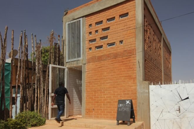 tall brick building used as a co-working space