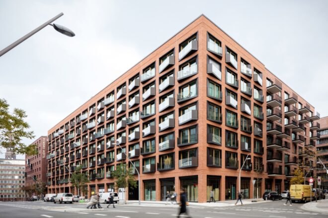 large brick building with several uniform windows