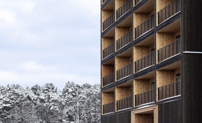angled view of balconies on a wood building