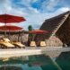 outdoor shot of swimming pool with lounge area