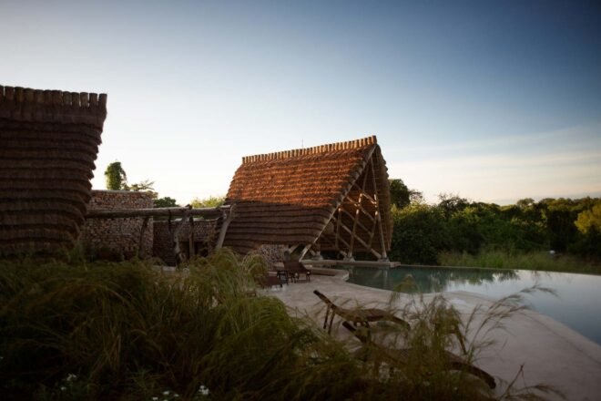 thatched roof structure on a river