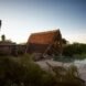 thatched roof structure on a river