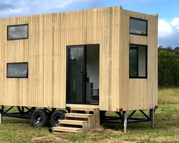 tiny home with blond wood exterior