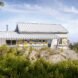 white home with dual pitched roofs