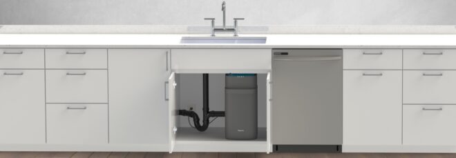 gray compost bin in cabinet under a sink