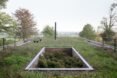 grassy roof of a brick home