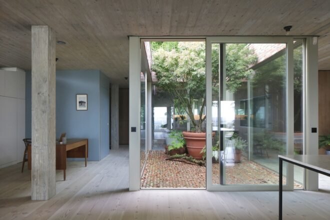 sliding glass door leading to courtyard