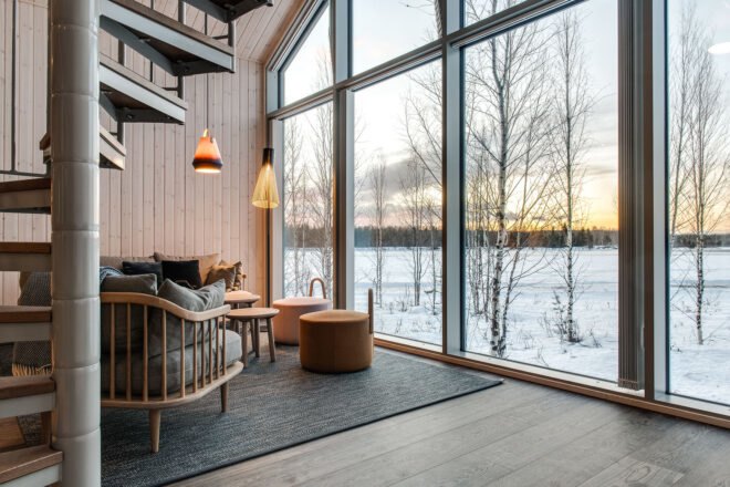 a warm living space with large glass wall