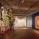 multicolored and patterned art hanging from a ceiling