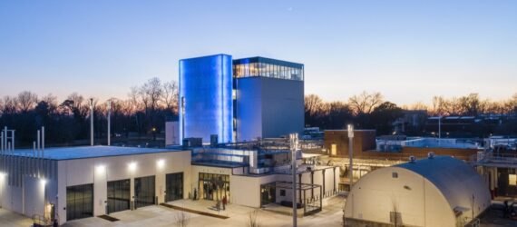 large white and blue building at dusk