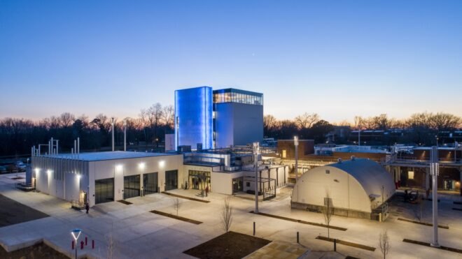 large white and blue building at dusk