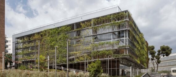large building covered in greenery