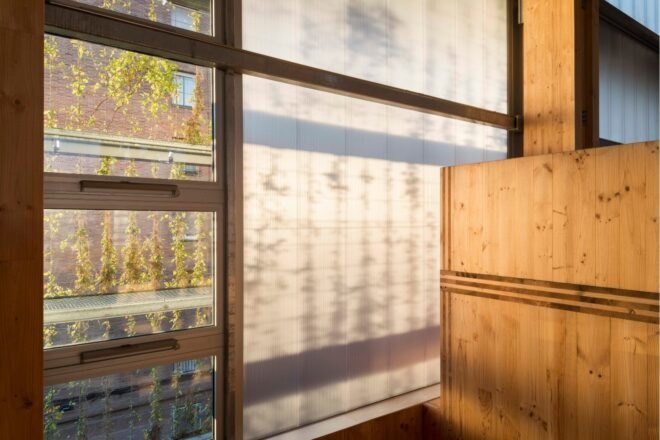 glazed wall with wooden accents