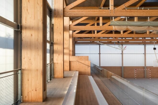 large interior space with wooden tressels