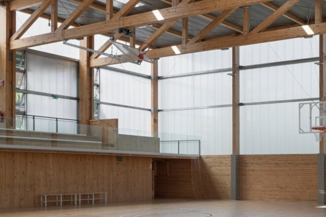 large basketball court with glazed facade