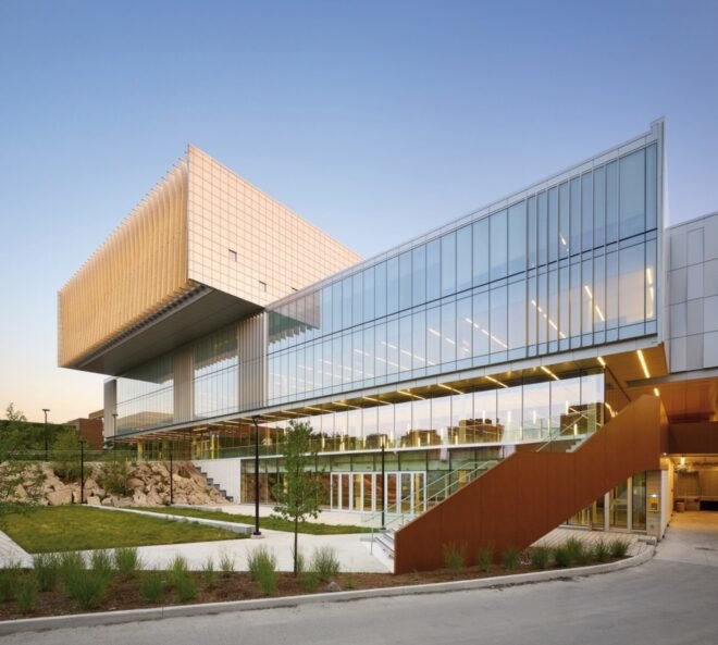 angled view of wood, tile and glass college building