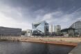 cube-shaped building with mirrored exterior