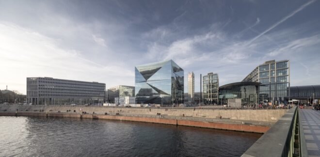 cube-shaped building with mirrored exterior