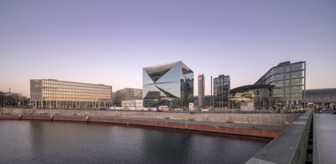 mirrored cube building near water