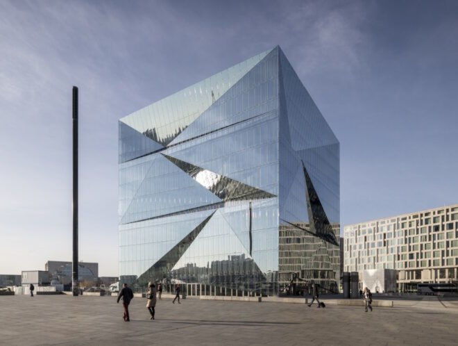 energy-efficient cube building with glazed exterior