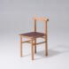 oak wood chair with a red seat