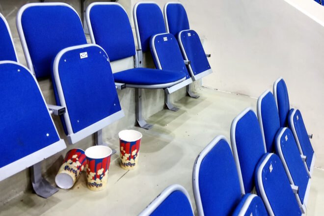 leftover popcorn left behind at a sports stadium