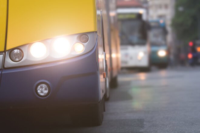close-up of yellow public bus