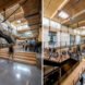 industrial interiors with light wood ceilings and concrete floors