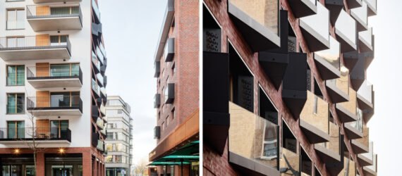 brick building covered in windows and small balconies