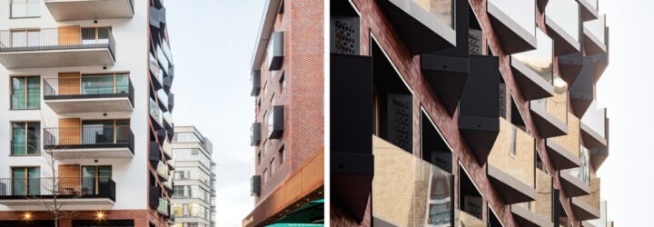 brick building covered in windows and small balconies