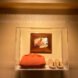 glass showcase box with clothing and shoes of Swami Kripalu