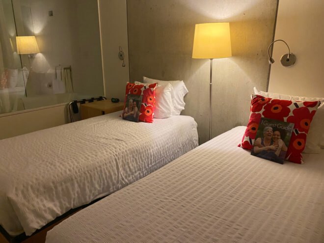 two white twin beds in a hotel room at Kripalu Center for Yoga & Health