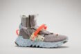 futuristic gray sneaker with orange straps