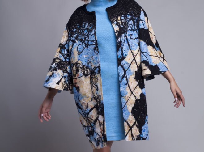 blue patterned coat over blue dress