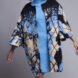 blue patterned coat over blue dress