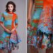 orange and blue striped sweater with orange and blue skirt