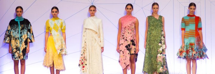 runway models wearing dresses made from recycled fabric