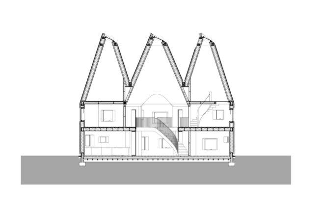 section view of home with four cylindrical towers