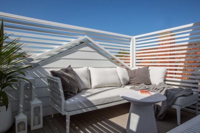 patio space with sofa and table
