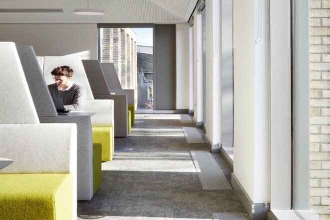 student sitting in booth