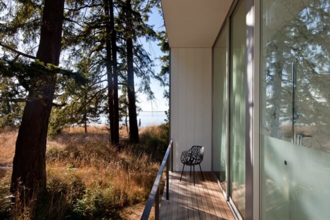 a small deck on the exterior of a home