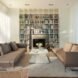 a large living space with two sofas and built-in book shelves