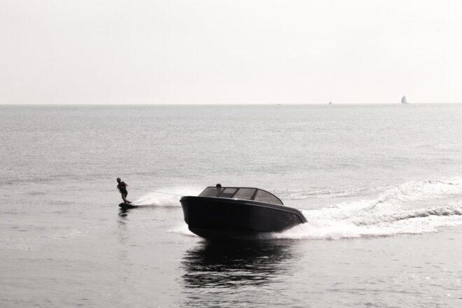 image of person water-skiing behind boat