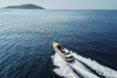 aerial shot of motorboat in the water